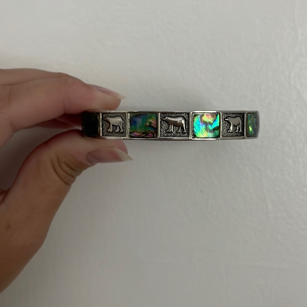 Startling silver cuff bracelet with bears and gem stones
